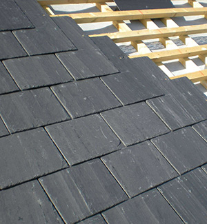 Part way through a slate roof in Gillingham